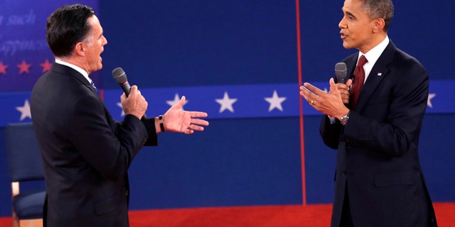 Oct. 16, 2012: Republican presidential nominee Mitt Romney and President Barack Obama speak during the second presidential debate.