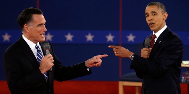 Oct. 16, 2012: Republican presidential nominee Mitt Romney  and President Barack Obama spar during the second presidential debate.