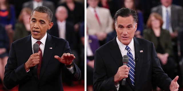 Oct. 16, 2012: President Barack Obama, left, and Republican presidential nominee Mitt Romney address the audience during the second presidential debate at Hofstra University.