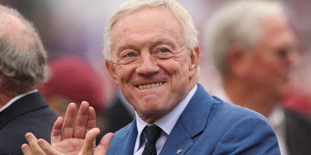 Oct 11, 2014; Fayetteville, AR, USA; Dallas Cowboys owner Jerry Jones is honored along with his teammates from the 1964 team prior to the game between the Alabama Crimson Tide and the Arkansas Razorbacks at Donald W. Reynolds Razorback Stadium. Mandatory Credit: Nelson Chenault-USA TODAY Sports