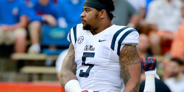 Oct 3, 2015; Gainesville, FL, USA; Mississippi Rebels defensive tackle Robert Nkemdiche (5) works out prior to the game at Ben Hill Griffin Stadium. Mandatory Credit: Kim Klement-USA TODAY Sports