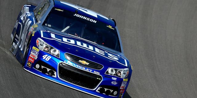 KANSAS CITY, KS - OCTOBER 17: Jimmie Johnson, driver of the #48 Lowe's Chevrolet, practices for the NASCAR Sprint Cup Series Hollywood Casino 400 at Kansas Speedway on October 17, 2015 in Kansas City, Kansas. (Photo by Chris Trotman/NASCAR via Getty Images)