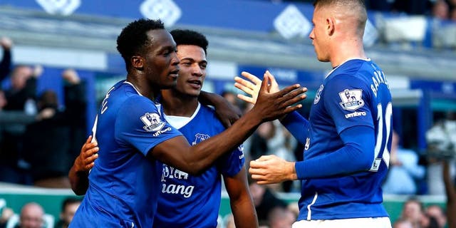 LIVERPOOL, ENGLAND - OCTOBER 04: Romelu Lukaku (L) of Everton celebrates with Tyias Browning (C) of Everton and Ross Barkley (R) of Everton after scoring Everton's first goal during the Barclays Premier League match between Everton and Liverpool at Goodison Park on October 4, 2015 in Liverpool, England. (Photo by Dean Mouhtaropoulos/Getty Images)