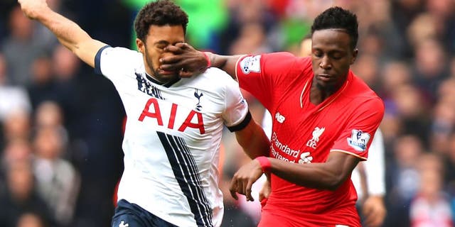 LONDON, ENGLAND - OCTOBER 17: Divock Origi of Liverpool and Mousa Dembele of Tottenham Hotspur compete for the ball during the Barclays Premier League match between Tottenham Hotspur and Liverpool at White Hart Lane on October 17, 2015 in London, England. (Photo by Bryn Lennon/Getty Images)