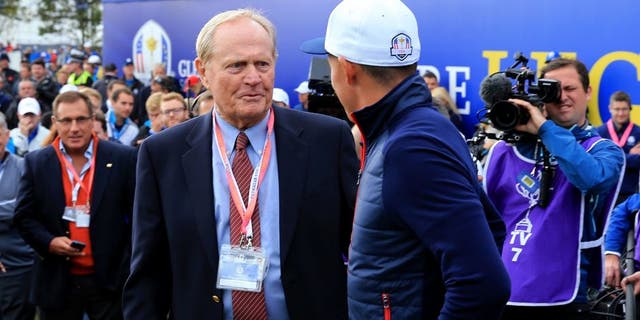 AUCHTERARDER, SCOTLAND - SEPTEMBER 28: Rickie Fowler of the United States (R) and Jack Nicklaus in discussion at the 1st tee during the Singles Matches of the 2014 Ryder Cup on the PGA Centenary course at the Gleneagles Hotel on September 28, 2014 in Auchterarder, Scotland. (Photo by David Cannon/Getty Images)