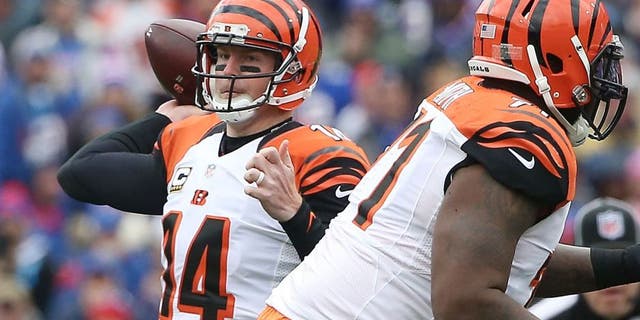 ORCHARD PARK, NY - OCTOBER 18: Andy Dalton #14 of the Cincinnati Bengals looks to throw against the Buffalo Bills during the first half at Ralph Wilson Stadium on October 18, 2015 in Orchard Park, New York. (Photo by Tom Szczerbowski/Getty Images)
