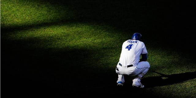 KANSAS CITY, MO - OCTOBER 17: Alex Gordon #4 of the Kansas City Royals waits to bat in the second inning against the Toronto Blue Jays in game two of the American League Championship Series at Kauffman Stadium on October 17, 2015 in Kansas City, Missouri. (Photo by Ed Zurga/Getty Images)