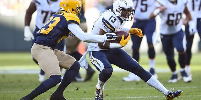 GREEN BAY, WI - OCTOBER 18: Keenan Allen #13 of the San Diego Chargers carries the football against Damarious Randall #23 of the Green Bay Packers in the second quarter at Lambeau Field on October 18, 2015 in Green Bay, Wisconsin. (Photo by Stacy Revere/Getty Images)