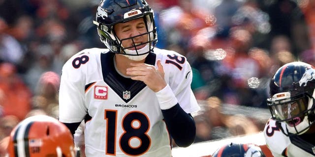 CLEVELAND, OH - OCTOBER 18: Denver Broncos quarterback Peyton Manning #18 calling the play at the line in the second half vs the Cleveland Browns at FirstEnergy Stadium in Cleveland, OH, October 18, 2015 (Photo By Joe Amon/The Denver Post via Getty Images)