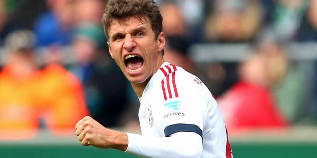 BREMEN, GERMANY - OCTOBER 17: Thomas Mueller of Muenchen celebrates scoring the opening goal during the Bundesliga match between SV Werder Bremen and FC Bayern Muenchen at Weserstadion on October 17, 2015 in Bremen, Germany. (Photo by Alexander Hassenstein/Bongarts/Getty Images)