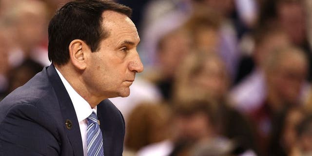 INDIANAPOLIS, IN - APRIL 04: Head Coach Mike Krzyzewski of the Duke Blue Devils looks on against the Michigan State Spartans during the NCAA Men's Final Four Semifinal at Lucas Oil Stadium on April 4, 2015 in Indianapolis, Indiana. Duke won 81-61. (Photo by Lance King/Getty Images)