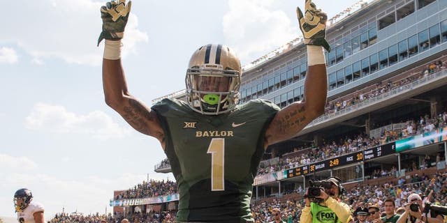 Sep 26, 2015; Waco, TX, USA; Baylor Bears wide receiver Corey Coleman (1) celebrates his touchdown against the Rice Owls during the second quarter at McLane Stadium. Mandatory Credit: Jerome Miron-USA TODAY Sports