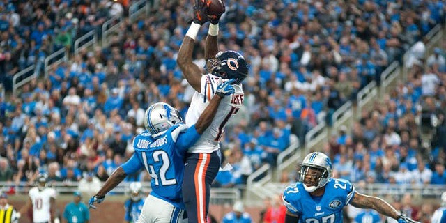 Oct 18, 2015; Detroit, MI, USA; Chicago Bears wide receiver Alshon Jeffery (17) catches a touchdown pass in front of Detroit Lions strong safety Isa Abdul-Quddus (42) during the fourth quarter at Ford Field. Mandatory Credit: Tim Fuller-USA TODAY Sports