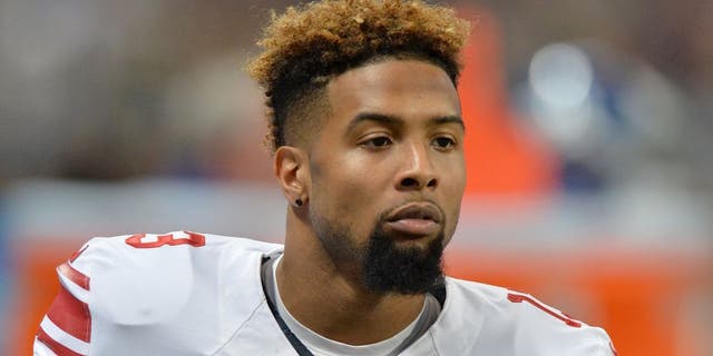 ST. LOUIS, MO - DECEMBER 21: Odell Beckham #13 of the New York Giants watches from the sidelines against the St. Louis Rams at the Edward Jones Dome on December 21, 2014 in St. Louis, Missouri. (Photo by Michael Thomas/Getty Images)
