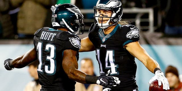 PHILADELPHIA, PA - OCTOBER 19: Riley Cooper #14 of the Philadelphia Eagles is congratulated by his teammate Josh Huff #13 after scoring a first quarter touchdown against the New York Giants at Lincoln Financial Field on October 19, 2015 in Philadelphia, Pennsylvania. (Photo by Rich Schultz/Getty Images)