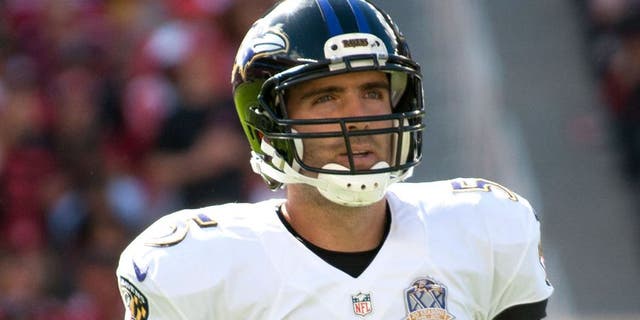 Oct 18, 2015; Santa Clara, CA, USA; Baltimore Ravens quarterback Joe Flacco (5) looks on during the first quarter of the game against the San Francisco 49ers at Levi's Stadium. The 49ers defeated the Ravens 25-20. Mandatory Credit: Ed Szczepanski-USA TODAY Sports