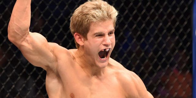 HOUSTON, TX - OCTOBER 03: in their lightweight bout during the UFC 192 event at the Toyota Center on October 3, 2015 in Houston, Texas. (Photo by Josh Hedges/Zuffa LLC/Zuffa LLC via Getty Images)