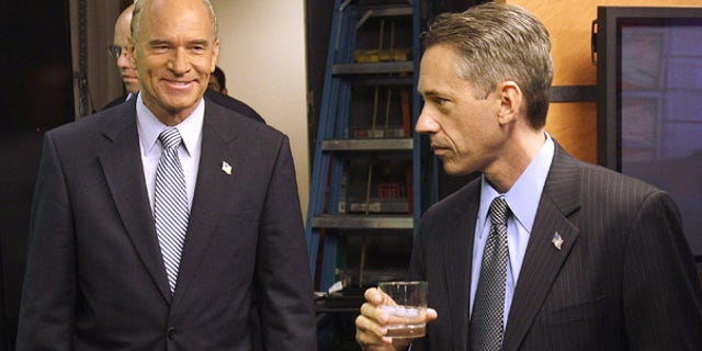 Oct. 13: Republican Jeff Perry, right, and Democrat Bill Keating prepare to debate in Newton, Mass.