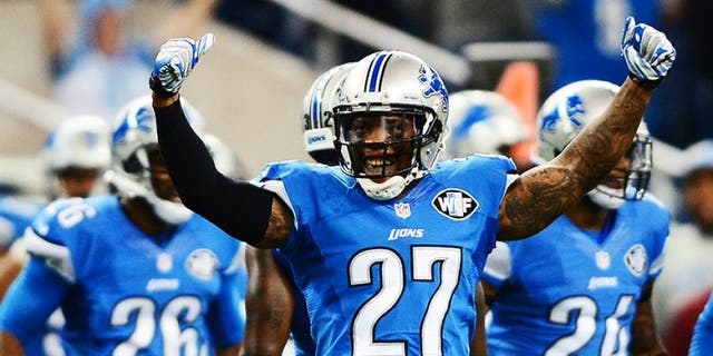 Oct 19, 2014; Detroit, MI, USA; Detroit Lions free safety Glover Quin (27) celebrates after defeating the New Orleans Saints 24-23 at Ford Field. Mandatory Credit: Andrew Weber-USA TODAY Sports