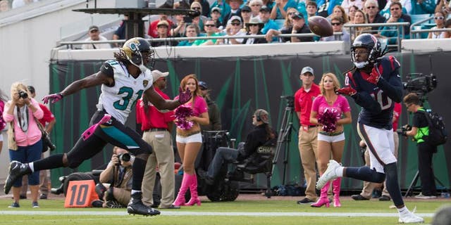 Oct 18, 2015; Jacksonville, FL, USA; Houston Texans wide receiver DeAndre Hopkins (10) beats Jacksonville Jaguars cornerback Davon House (31) for a touchdown in the fourth quarter at EverBank Field. The Houston Texans won 31-20. Mandatory Credit: Logan Bowles-USA TODAY Sports