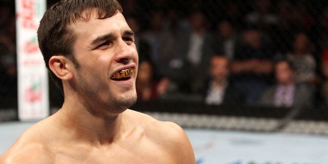 SAITAMA, JAPAN - SEPTEMBER 20: Myles Jury reacts after his win over Takanori Gomi in their lightweight bout during the UFC Fight Night event inside the Saitama Arena on September 20, 2014 in Saitama, Japan. (Photo by Mitch Viquez/Zuffa LLC/Zuffa LLC via Getty Images)
