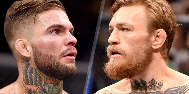 LAS VEGAS, NV - JULY 11: Cody Garbrandt awaits the final decison in his bantamweight fight during the UFC 189 event inside MGM Grand Garden Arena on July 11, 2015 in Las Vegas, Nevada. (Photo by Josh Hedges/Zuffa LLC/Zuffa LLC via Getty Images) LAS VEGAS, NV - JULY 11: Conor McGregor prepares to faces Chad Mendes in their UFC interim featherweight title fight during the UFC 189 event inside MGM Grand Garden Arena on July 11, 2015 in Las Vegas, Nevada. (Photo by Josh Hedges/Zuffa LLC/Zuffa LLC via Getty Images)