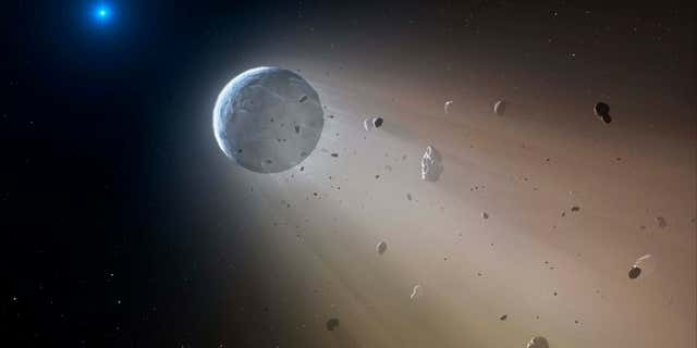 This artist's rendering provided by the Harvard-Smithsonian Center for Astrophysics shows an asteroid slowly disintegrating as it orbits a white dwarf star.