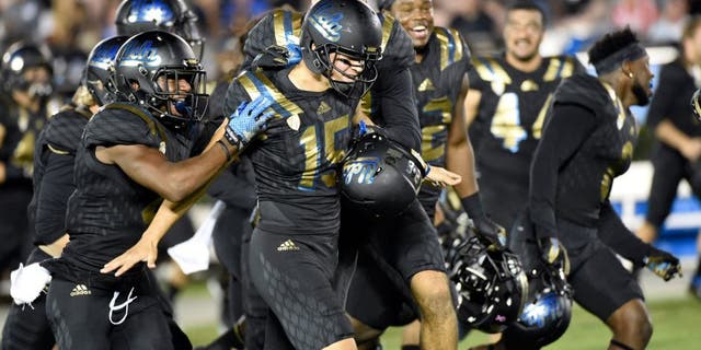 Oct 22, 2015; Pasadena, CA, USA; UCLA Bruins place kicker Ka'imi Fairbairn (15) celebrates making a sixty-yard field goal against the California Golden Bears during the second quarter at Rose Bowl. Mandatory Credit: Richard Mackson-USA TODAY Sports
