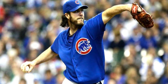 MILWAUKEE, WI - OCTOBER 4: Dan Haren #50 of the Chicago Cubs throws to the Milwaukee Brewers in the first inning of a baseball game at Miller Park on October 4, 2015 in Milwaukee, Wisconsin. (Photo by Jeffrey Phelps/Getty Images)