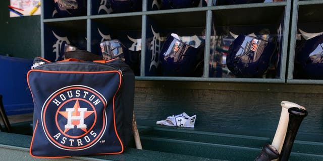 DETROIT, MI - MAY 23: A detailed view of a Houston Astros equipment bag and batting helmets in the dugout prior to the game against the Detroit Tigers at Comerica Park on May 23, 2015 in Detroit, Michigan. The Astros defeated the Tigers 3-2. (Photo by Mark Cunningham/MLB Photos via Getty Images)