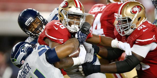 SANTA CLARA, CA - OCTOBER 22: Carlos Hyde #28 of the San Francisco 49ers rushes with the ball against the Seattle Seahawks during their NFL game at Levi's Stadium on October 22, 2015 in Santa Clara, California. (Photo by Ezra Shaw/Getty Images)