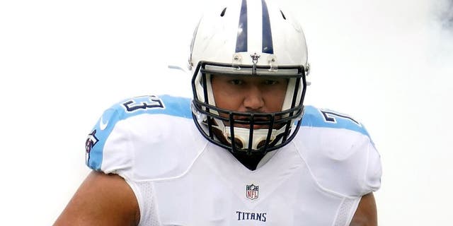 NASHVILLE, TN - SEPTEMBER 27: Jeremiah Poutasi #73 of the Tennessee Titans runs onto the field prior to a game against the Indianapolis Colts at Nissan Stadium on September 27, 2015 in Nashville, Tennessee. (Photo by Frederick Breedon/Getty Images)