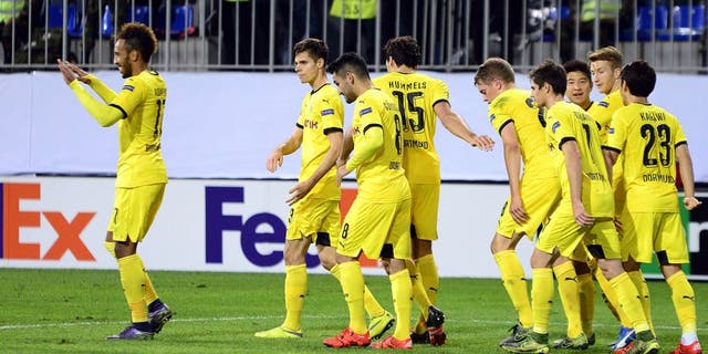 Dortmund's players celebrate a goal during the UEFA Europa League group C football match between Qabala FK and Borussia Dortmund in Baku on October 22, 2015. AFP PHOTO / TOFIK BABAYEV (Photo credit should read TOFIK BABAYEV/AFP/Getty Images)
