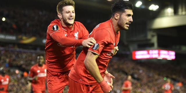 LIVERPOOL, ENGLAND - OCTOBER 22: Emre Can (R) of Liverpool is congratulated by teammate Adam Lallana of Liverpool after scoring a goal to level the scores at 1-1 during the UEFA Europa League Group B match between Liverpool FC and Rubin Kazan at Anfield on October 22, 2015 in Liverpool, United Kingdom. (Photo by Michael Regan/Getty Images)