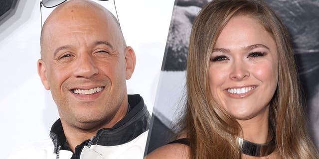 HOLLYWOOD, CA - APRIL 01: Actor Vin Diesel arrives at the Los Angeles premiere of "Furious 7" at TCL Chinese Theatre IMAX on April 1, 2015 in Hollywood, California. (Photo by Gregg DeGuire/WireImage), HOLLYWOOD, CA - APRIL 01: Ronda Rousey arrvies at the "Furious 7" - Los Angeles Premiere at TCL Chinese Theatre IMAX on April 1, 2015 in Hollywood, California. (Photo by Steve Granitz/WireImage)
