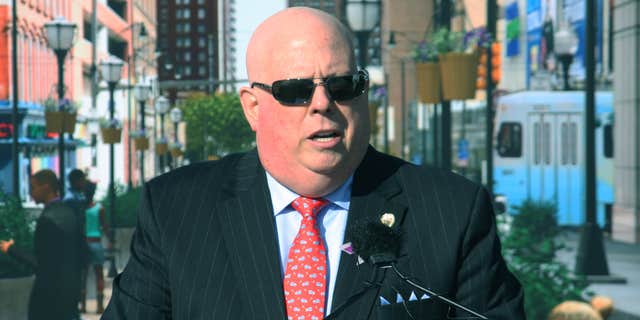 Oct. 22, 2015: Maryland Gov. Larry Hogan announces a $135 million plan to redesign Baltimore’s transit system during a news conference at a commuter train station, where he spoke in front of a backdrop of a city scene.