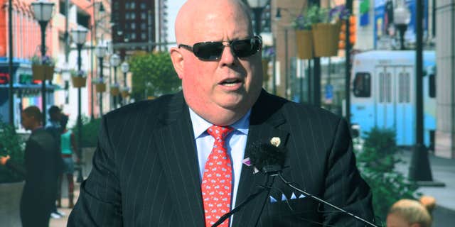 Oct. 22, 2015: Maryland Gov. Larry Hogan announces a $135 million plan to redesign Baltimore’s transit system during a news conference at a commuter train station, where he spoke in front of a backdrop of a city scene.