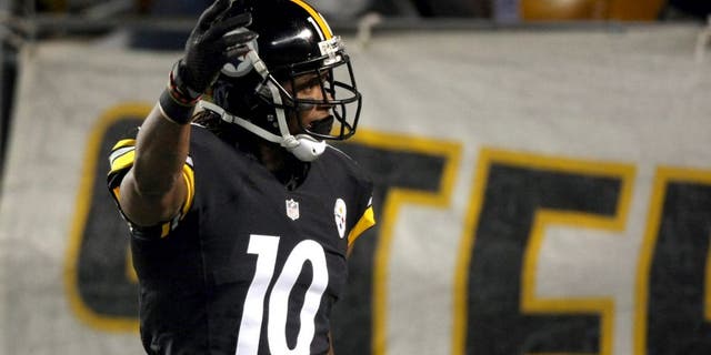 Oct 20, 2014; Pittsburgh, PA, USA; Pittsburgh Steelers wide receiver Martavis Bryant (10) celebrates his touchdown catch against the Houston Texans during the first half at Heinz Field. Mandatory Credit: Jason Bridge-USA TODAY Sports