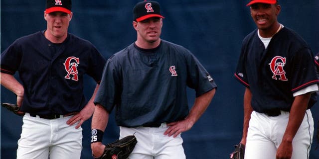 SP.Angel.Outfield.grp.0223.AAGññAngels outfielders during spring training practice (lñR) Darin Erstad, Jim Edmonds, and Garret Anderson. (Photo by Alex Garcia/Los Angeles Times via Getty Images)