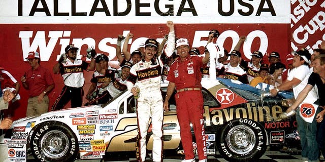 TALLADEGA, AL - MAY 3, 1987: Davey Allison and his crew celebrate in victory lane following their win in the Winston 500 at Alabama International Motor Speedway. It was Allisonâs first career NASCAR Cup victory. (Photo by ISC Images & Archives via Getty Images)