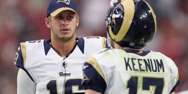 GLENDALE, AZ - OCTOBER 02: Quarterback Jared Goff #16 of the Los Angeles Rams talks with Case Keenum #17 on the sidelines during the NFL game against the Arizona Cardinals at the University of Phoenix Stadium on October 2, 2016 in Glendale, Arizona. The Rams defeated the Cardinals 17-13. (Photo by Christian Petersen/Getty Images)