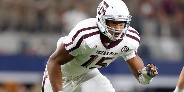 Sep 26, 2015; Arlington, TX, USA; Texas A&M Aggies defensive lineman Myles Garrett (15) in action against the Arkansas Razorbacks at AT&T Stadium. Mandatory Credit: Matthew Emmons-USA TODAY Sports