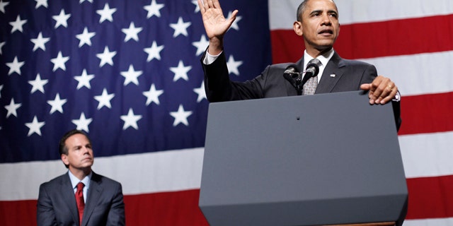 Oct. 25: President Barack Obama delivers remarks at the DCCC reception at the Rhode Island Convention Center in Providence, R.I. Sitting on stage behind Obama is Providence Mayor and Democratic Congressional candidate David Cicilline.