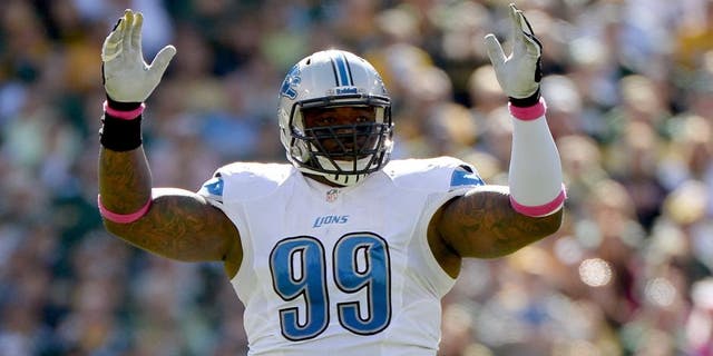 GREEN BAY, WI - OCTOBER 06: C.J. Mosley #99 of the Detroit Lions reacts after a Lions field goal to trail 6-3 to the Green Bay Packers during the second quarter at Lambeau Field on October 6, 2013 in Green Bay, Wisconsin. (Photo by Harry How/Getty Images)