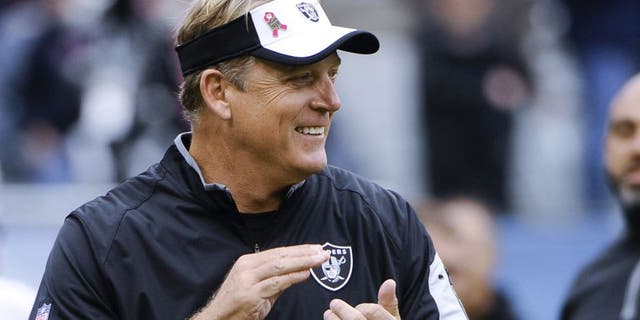 Oct 4, 2015; Chicago, IL, USA; Oakland Raiders head coach Jack Del Rio claps before the game against the Chicago Bears at Soldier Field. Mandatory Credit: Matt Marton-USA TODAY Sports