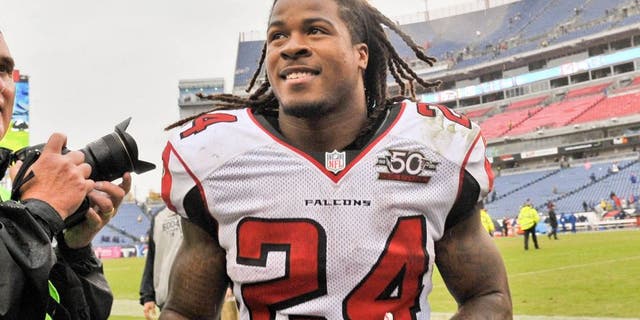 Oct 25, 2015; Nashville, TN, USA; Atlanta Falcons running back Devonta Freeman (24) runs off the field after defeating the Tennessee Titans during the second half at Nissan Stadium. Atlanta won 10-7. Mandatory Credit: Jim Brown-USA TODAY Sports