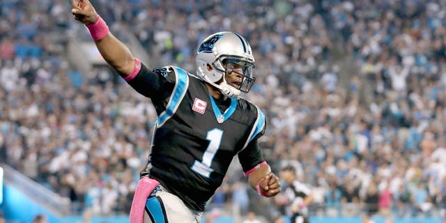 CHARLOTTE, NC - OCTOBER 25: Cam Newton #1 of the Carolina Panthers salutes the crowd after their first touchdown against the Philadelphia Eagles at Bank of America Stadium on October 25, 2015 in Charlotte, North Carolina. (Photo by Streeter Lecka/Getty Images)