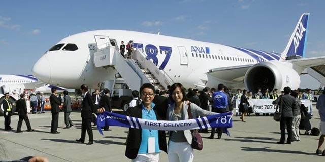 October 26, 2011: An All Nippon Airways Boeing 787 lands at Hong Kong International Airport for the airplane's inaugural commercial flight from Japan.