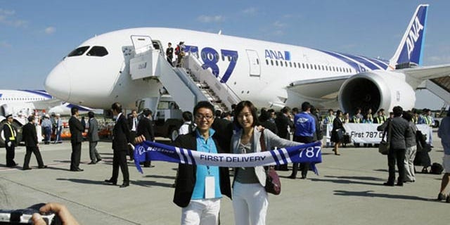 October 26, 2011: An All Nippon Airways Boeing 787 lands at Hong Kong International Airport for the airplane's inaugural commercial flight from Japan.