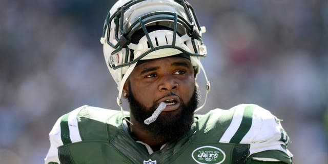 EAST RUTHERFORD, NJ - SEPTEMBER 28: Sheldon Richardson #91 of the New York Jets reacts during their 24 to 17 loss to the Detroit Lions at MetLife Stadium on September 28, 2014 in East Rutherford, New Jersey. (Photo by Ron Antonelli/Getty Images)